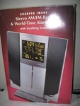 Sharper Image World Clock Radio Noaa Soother Sound SU500 Factory Seal # 2170 Uuu. Fixed Price $69.95.