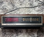 Vintage 80'S General Electric Digital Walnut Grain Alarm Clock Radio 7-4640B. Fixed Price $26.25.