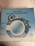 Rare! 2006 Sharper Image Cd Shower Radio With Mirror & Clock # GT909 Nib Sealed. Fixed Price $60.00.