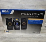 Rca RS3081I Cd Audio System Iphone Ipod Rotating Dock Fm Radio Speakers Remote. Fixed Price $79.99.