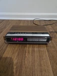 Vintage Wood Grain Digital Clock Am/fm Radio Alarm Model 7-4633D. Fixed Price $22.95.