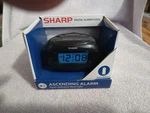 Sharp SPC483A Digital Alarm Clock Black, Battery-operated, Traveling. Fixed Price $10.00.
