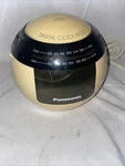 Vintage Panasonic RC-70 "ball" Clock Radio Tan Space Damaged. Fixed Price $10.00.