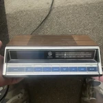 General Electric 7-4602B Digital Am/fm Woodgrain Clock Radio W/ Snooze Backup. Fixed Price $30.00.