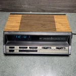 General Electric 7-4666A Alarm Clock Am Fm Radio Wood Grain Works Vintage. Fixed Price $49.99.