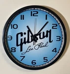 Gibson Les Paul Logo Battery Operated Wall Clock. Fixed Price $49.00.