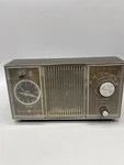Vintage General Electric Clock Radio - Dark Brown Model C1405A Untested. Fixed Price $9.95.