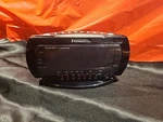 Black Emerson Smartset Radio Alarm Clock, Am/fm W/DATE-CKS2235B. Fixed Price $12.79.