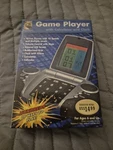 Innovage 2007 Portable Game Player With Calculator Alarm Clock Handheld. Fixed Price $9.95.