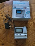 Ravinia Clock Company Projection Atomic Alarm W/ Adapter Time & Temp. Fixed Price $18.00.
