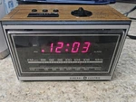 Vintage General Electric Teak Wood Look Alarm Clock Radio 7-4620D Brown Blk. Fixed Price $16.99.