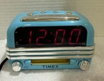 Timex T-147L Blue Retro Alarm Clock Radio With Rock & Roll Sounds. Fixed Price $16.50.