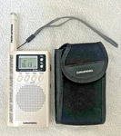 Grundig Mini 300 World Band Receiver Handheld Compact White Sw/fm Radio Case. Fixed Price $27.00.