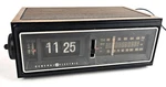 General Electric 7-4303G "flip" Alarm Clock Am/fm Radio Working. Fixed Price $99.00.