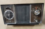 Vintage General Electric Clock Radio - Dark Brown Model C1405A Works. Fixed Price $20.00.