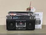 Qfx Am/fm/ SW1-2 Radio Cassette Boombox With Bluetooth, Handle & Upconvert. Fixed Price $50.39.