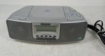 Panasonic Player Radio Alarm Clock Combination Model RC-CD500 Silver (tested). Fixed Price $29.00.