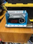 Sharp Digital Alarm Clock, 2 Amp High-speed Usb Charging Port, SPC547. Fixed Price $12.00.