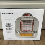 Crosley Diner Jukebox Tabletop Bluetooth Radio Chrome Plated CR1120A-SI Silver. Fixed Price $45.99.