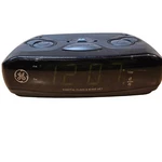 General Electric #7-4837C Am/fm Digital Alarm Clock Radio Green Light Display. Fixed Price $15.00.