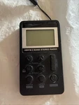 Pocket Small Radio By Flyoukki, Personal Mini Am Fm Portable Digital Tuning. Fixed Price $9.00.