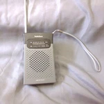 Radio Shack Am/fm Pocket CAT#12-586 W/wrist Strap (works). Fixed Price $14.09.