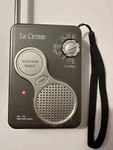 La Crosse Gray Am/fm Noaa Weather Band Handheld Radio Model 809-905. Fixed Price $5.50.