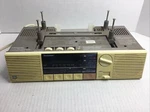 Vintage Spacemaker Am/fm Clock Radio W/ Bracket & Light Model 7-4250A. Fixed Price $30.00.