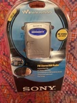 New Sony SRF-59 Am/fm Walkman Radio Silver Headphones/belt Clip In Package. Fixed Price $90.00.