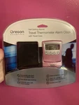 New Pink Oregon Scientific Self-setting Atomic Travel Thermometer Alarm Clock. Fixed Price $39.99.