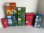 Lot Of 8 Boxes Phillips Christmas Lights, Various Styles + Projection. Fixed Price $29.99.