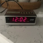Vintage Cosmo Time Alarm Clock Model No: E521 Led Woodgrain Works. Fixed Price $9.99.