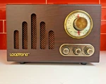 Looptone SR08 Retro Wood Bluetooth Am/fm Radio Tabletop Speaker - Vertical Slats. Fixed Price $28.12.