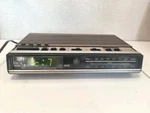 Vintage Woodgrain Digital Am/fm Alarm Clock Radio Model 7-4638B (working). Fixed Price $30.00.