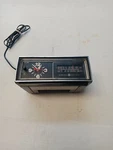 General Electric Vintage Woodgrain Am/fm Alarm Clock Radio Model No. 7-4545B. Fixed Price $14.25.