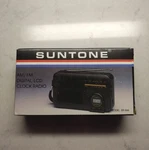 Brand New Suntone Am/ Fm Digital Lcd Clock Radio, Model RR-666. Fixed Price $25.00.