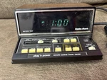 Vtg Radio Shack Plug Power Clock & Remote-control Timer Center 61-2679A. Fixed Price $17.00.