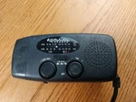 Katahdin Sports Hand Crank Dynamo Survival Radio Black Weather Light MP3 Speaker. Fixed Price $9.99.