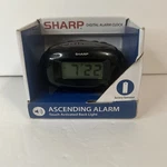 Sharp Lcd Digital Alarm Clock, Black, SPC500A. Fixed Price $10.00.