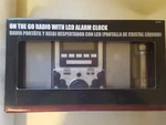 On The Go Radio With Lcd Alarm Clock. Fixed Price $15.99.