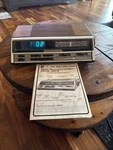 General Electric 7-4666A Alarm Clock Am Fm Radio Wood Grain Works Vintage. Fixed Price $45.95.