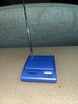 The Timex Flip Top Travel Alarm Clock Am/fm Portable Radio Model T315L. Fixed Price $17.00.