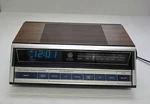 Vintage General Electric 7-4662B Am/fm Alarm Clock Radio Wood Grain Tested. Fixed Price $54.00.