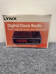 Lynx Model U181 Am/fm Alarm Clock Radio World Time Woodgrain Retro New. Fixed Price $19.99.