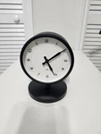Target Brands Modern Round Black Metal Desk Clock, Analog Quartz, White Face. Fixed Price $15.99.