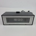 Vintage General Electric Chronotel Black Flip Alarm Clock Lighted Dial 8142-4. Fixed Price $49.99.