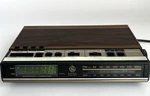 7-4638A Vintage Am/fm Digital Clock Radio Dual Alarm Woodgrain Tested Works. Fixed Price $29.99.