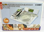 Vintage (2004) Coby CD-RA195 Telephone Player Alarm Clock Radio Combo. Fixed Price $39.95.