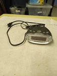 Sylvania Model SCR1276 Am/fm Alarm Radio Ac/battery Powered (clocksa). Fixed Price $8.00.