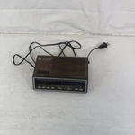 7-4636D Wood Grain Vintage Am/fm Radio Clock W/ Dual Alarms Works 1985. Fixed Price $22.00.